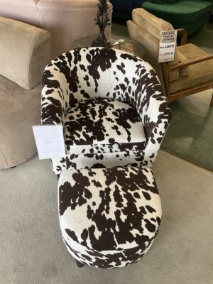 Cow print tub chair with ottoman